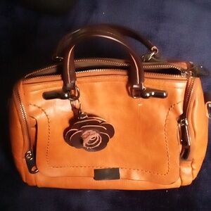 A rose leather purse